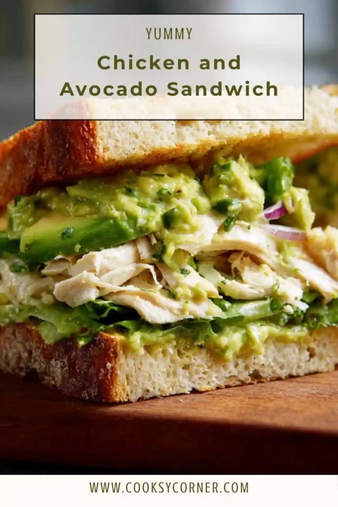 Close-up of a Chicken and Avocado Sandwich cut in half showing creamy avocado chicken filling.