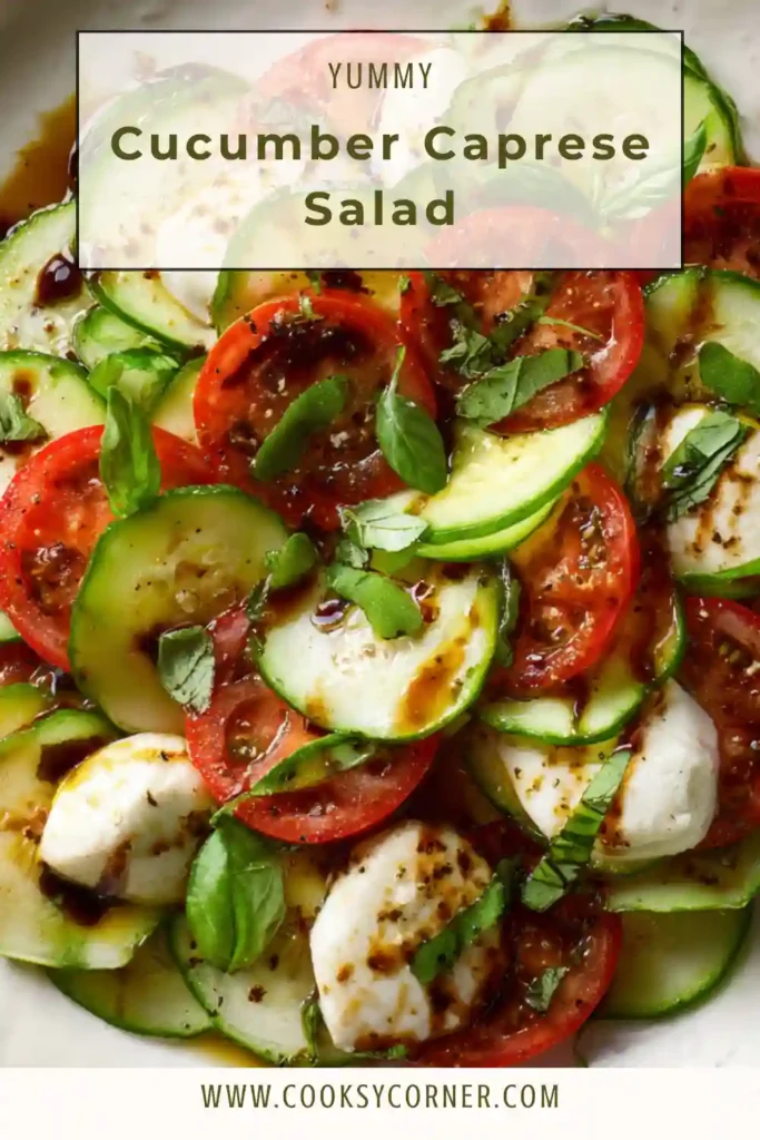 Fresh cucumber caprese salad arranged with juicy heirloom tomatoes, creamy mozzarella slices, and basil leaves on a serving platter.