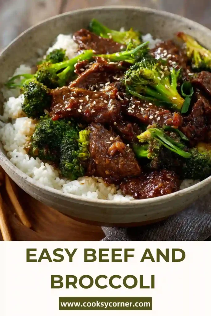 Bowl of beef stir fry with broccoli and onions served over rice.