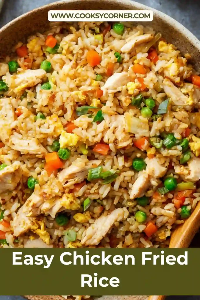 Close-up of chicken fried rice with tender chicken pieces and fluffy rice grains.
