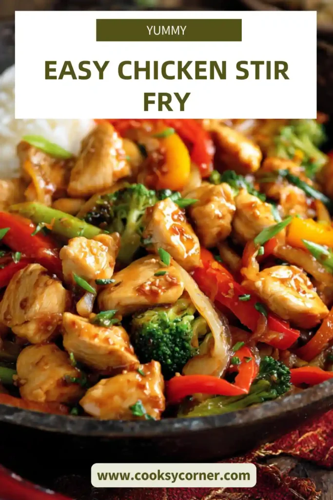 Easy chicken stir fry served in a bowl with broccoli, bell peppers, and carrots in a glossy sauce.