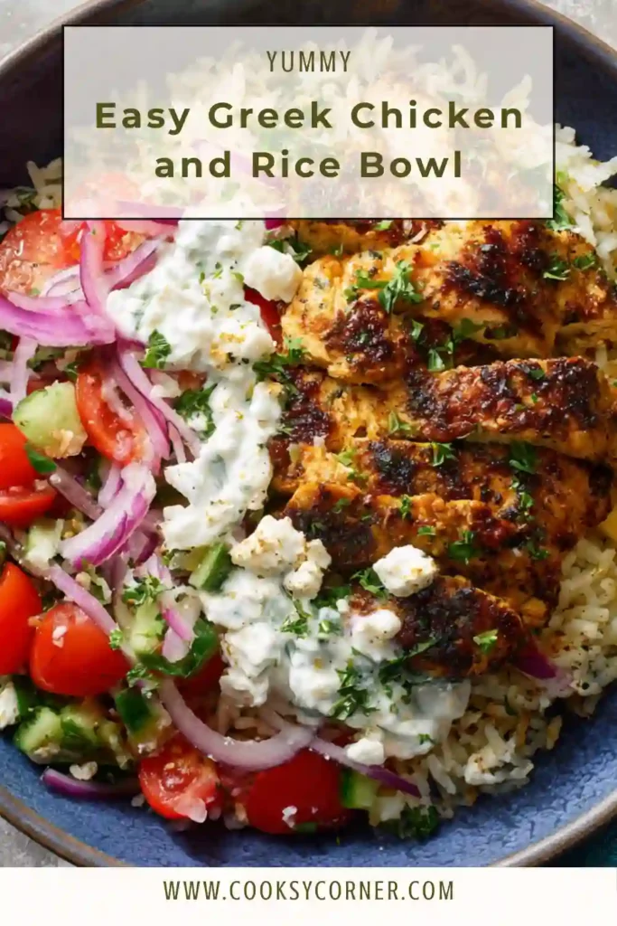 Greek chicken and rice bowl topped with tomato cucumber salad, feta cheese, and tzatziki sauce.