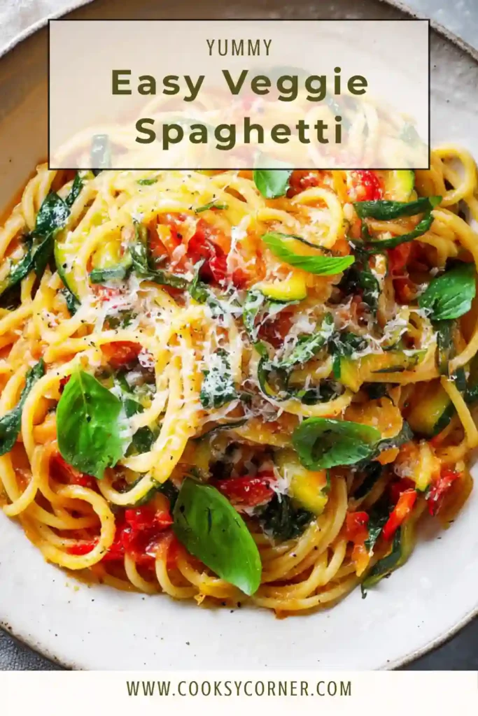 Healthy veggie spaghetti with zucchini, yellow squash, and spinach in a chunky tomato sauce. Fresh basil and parmesan finish the dish.