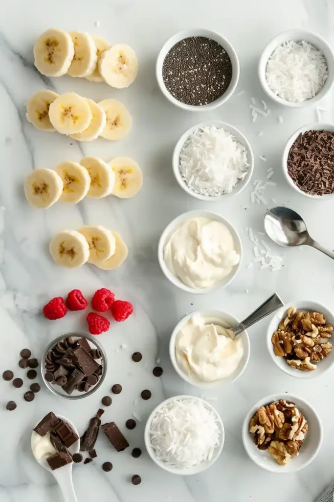 Yogurt-covered frozen banana slices topped with nuts and cereal.
