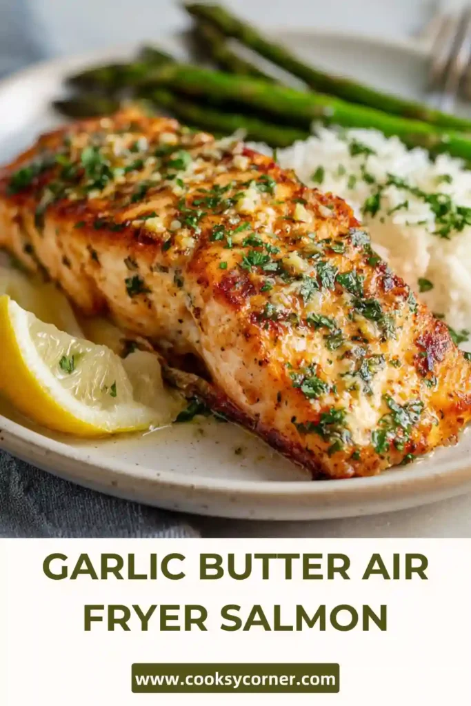 Juicy salmon fillets cooked in air fryer with garlic butter sauce.