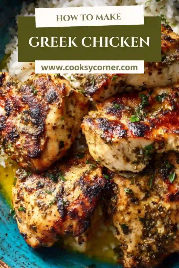 Close-up of Greek chicken thighs cooked with lemon, garlic, and herbs in a skillet. The dish is vibrant and aromatic with Mediterranean flavors.