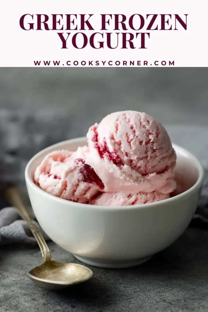 Creamy strawberry Greek frozen yogurt served in a dessert bowl with mint garnish.
