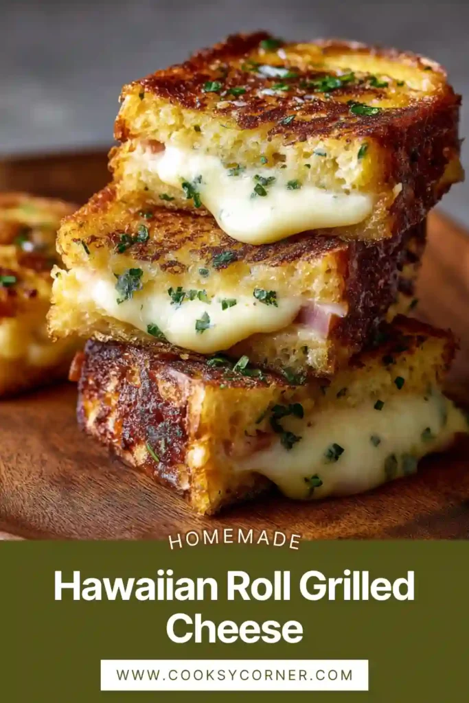 Close-up of cheesy Hawaiian roll sandwich with gooey melted Monterey Jack cheese.