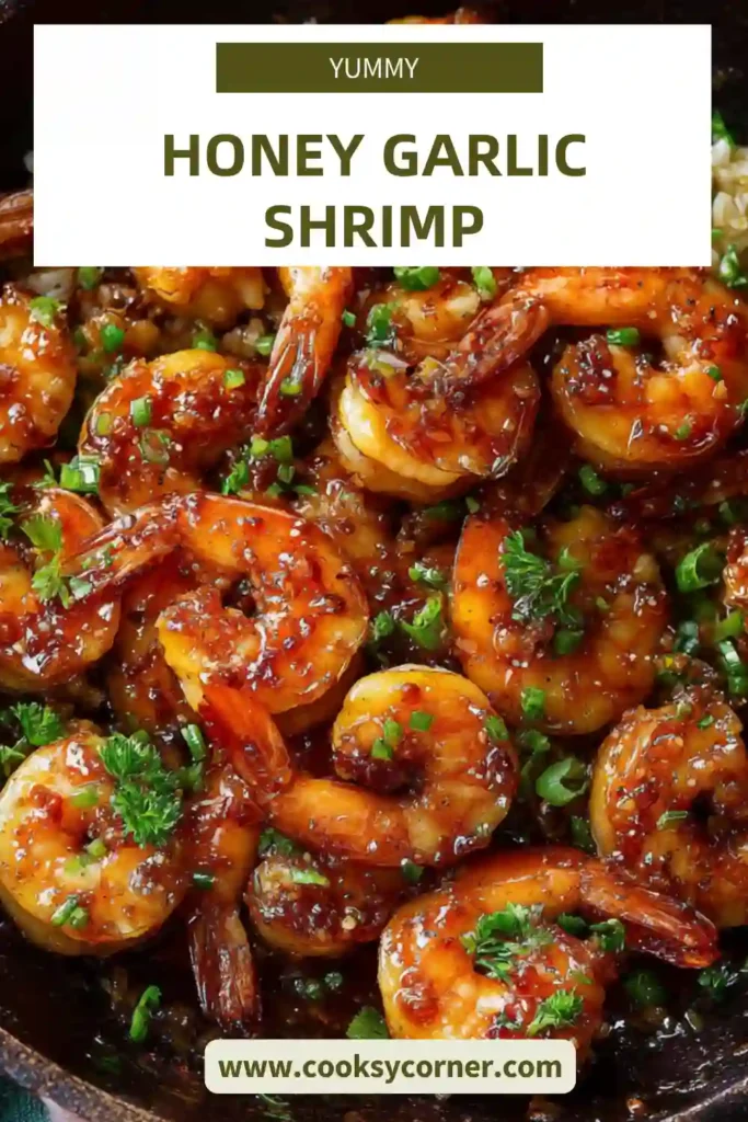 Honey garlic shrimp served over rice with green onion garnish.