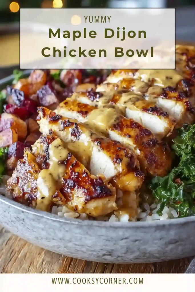 A Maple Dijon Chicken Bowl with roasted sweet potatoes and glazed chicken served in a rustic bowl. The dish looks warm and perfect for a cozy fall dinner.
