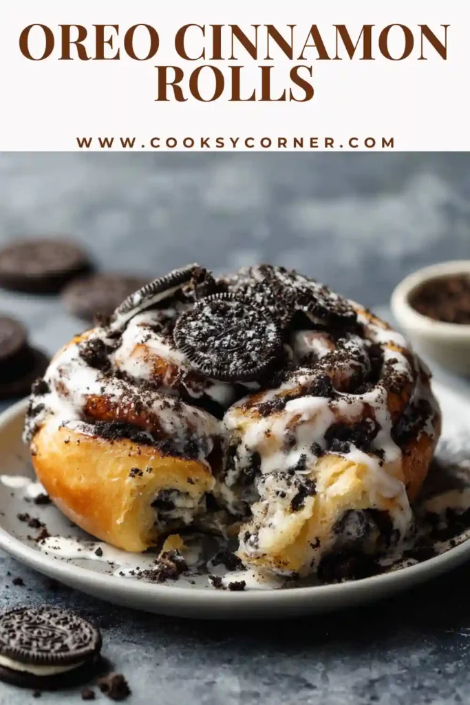 Warm Oreo cinnamon rolls served in a baking pan with thick cream cheese glaze.