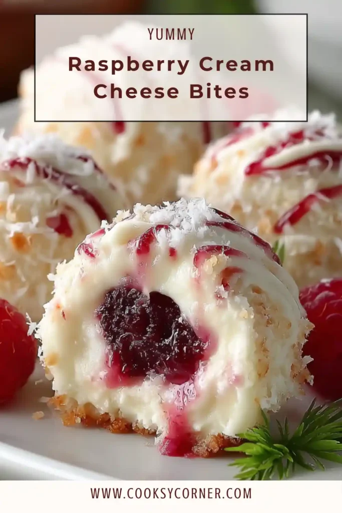 Close-up of Raspberry Cream Cheese Bites showing creamy filling inside flaky puff pastry with raspberry jam. The dessert looks buttery, golden, and freshly baked.