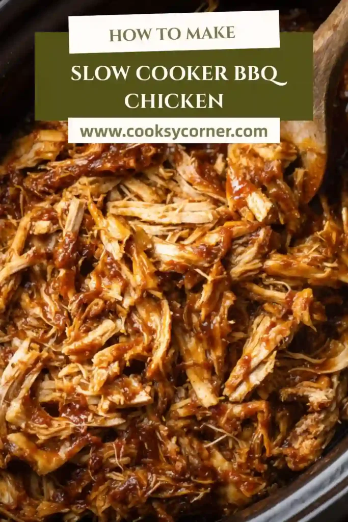 Close-up of shredded BBQ chicken coated in thick barbecue sauce.