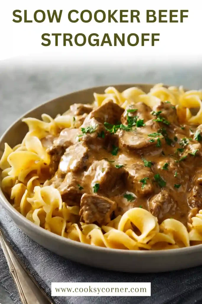 Close-up of creamy beef stroganoff with noodles and thick mushroom sauce.