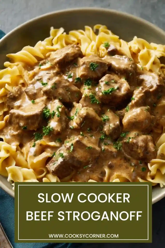 Crockpot beef stroganoff in a slow cooker with rich creamy texture and chunks of beef.