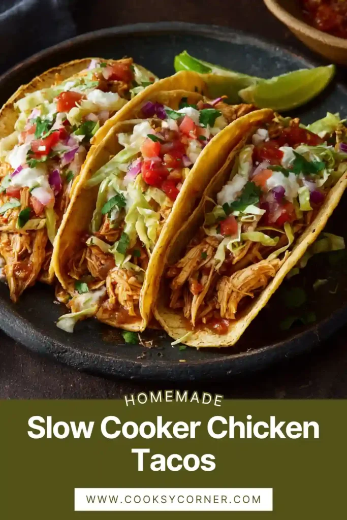 Crockpot shredded chicken tacos with fresh toppings and soft tortillas.