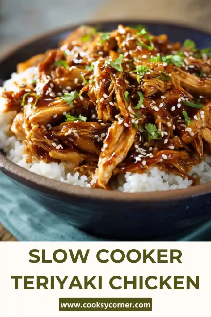 Slow Cooker Teriyaki Chicken served over rice with sesame seeds and green onions.