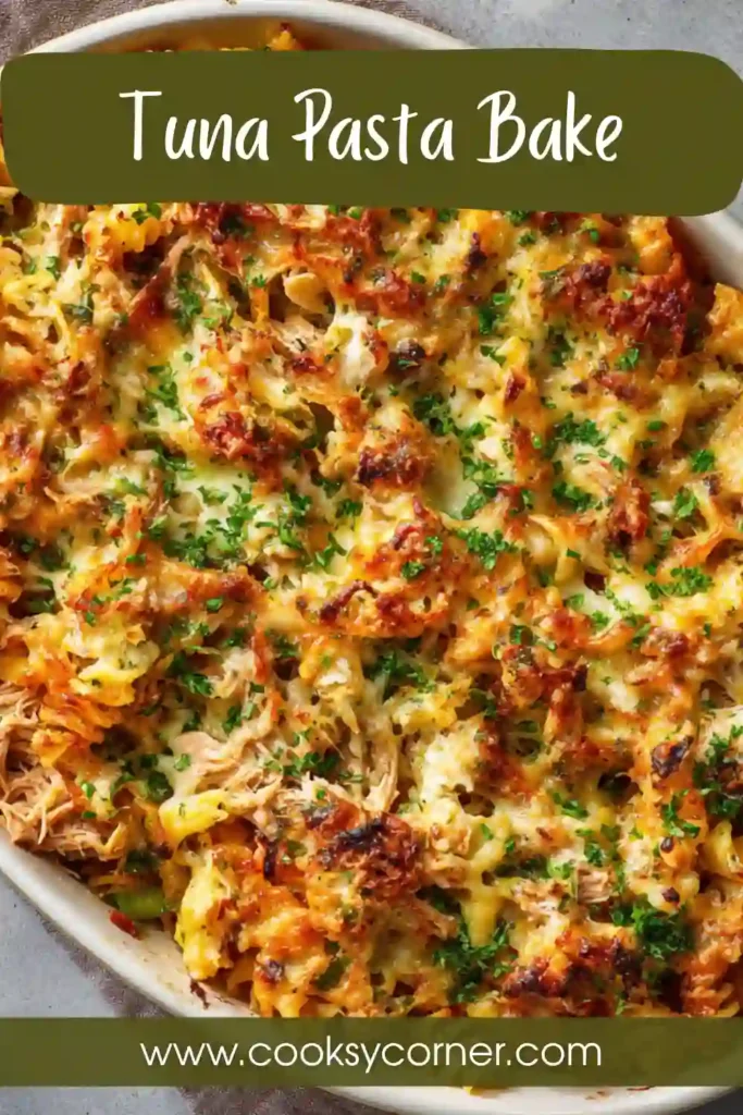 Cheesy tuna pasta bake fresh from the oven with golden crust and visible chunks of tuna and vegetables.