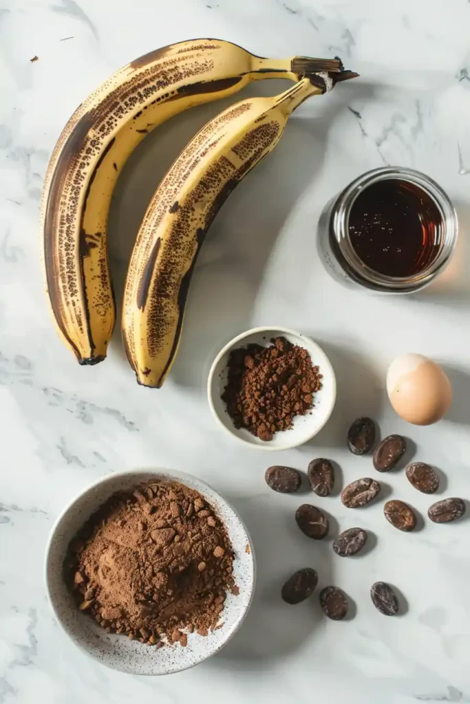 Homemade 4 ingredient chocolate cake baked in a round pan with a cracked top and smooth texture.
