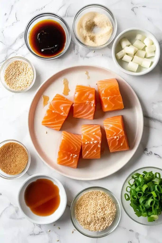 Crispy air fryer salmon pieces with glossy sauce and herbs. Simple and delicious recipe.