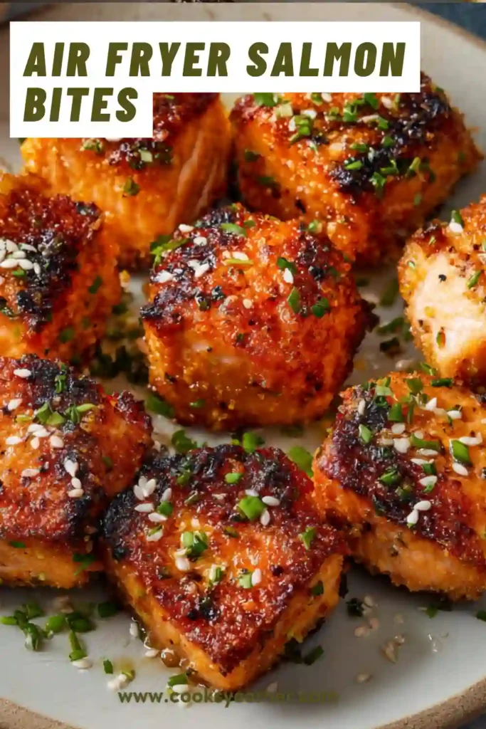 Close-up of salmon cubes coated in glaze and cooked in air fryer. Healthy and flavorful dish.