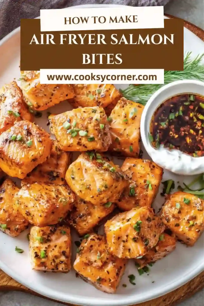 Homemade Air Fryer Salmon Bites arranged neatly with a crispy crust and glossy honey hot sauce topping.