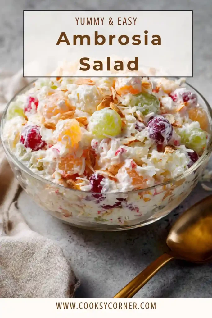 Classic ambrosia salad served chilled with fruit and marshmallows mixed in a creamy base.