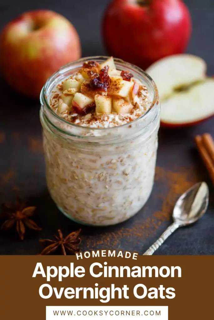 Close-up of apple cinnamon overnight oats in a mason jar with diced apples and cinnamon sprinkled on top. A nutritious meal prep breakfast.