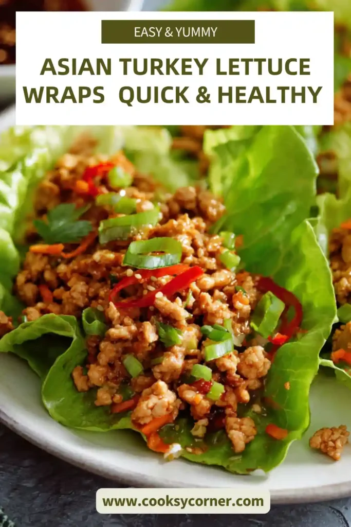 Asian turkey lettuce wraps filled with seasoned ground turkey and topped with green onions in fresh lettuce leaves.