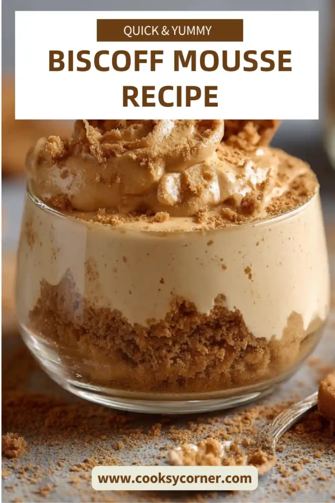 Creamy Biscoff mousse served in a glass topped with cookie crumbs.
