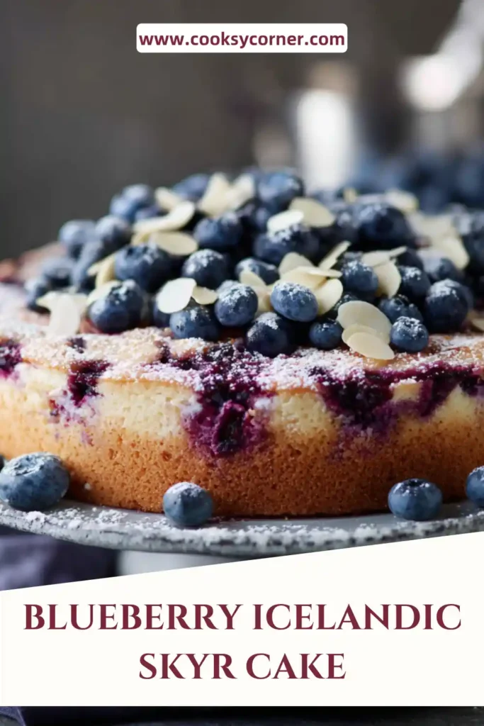 Slice of skyr cake showing smooth texture and crumbly crust.