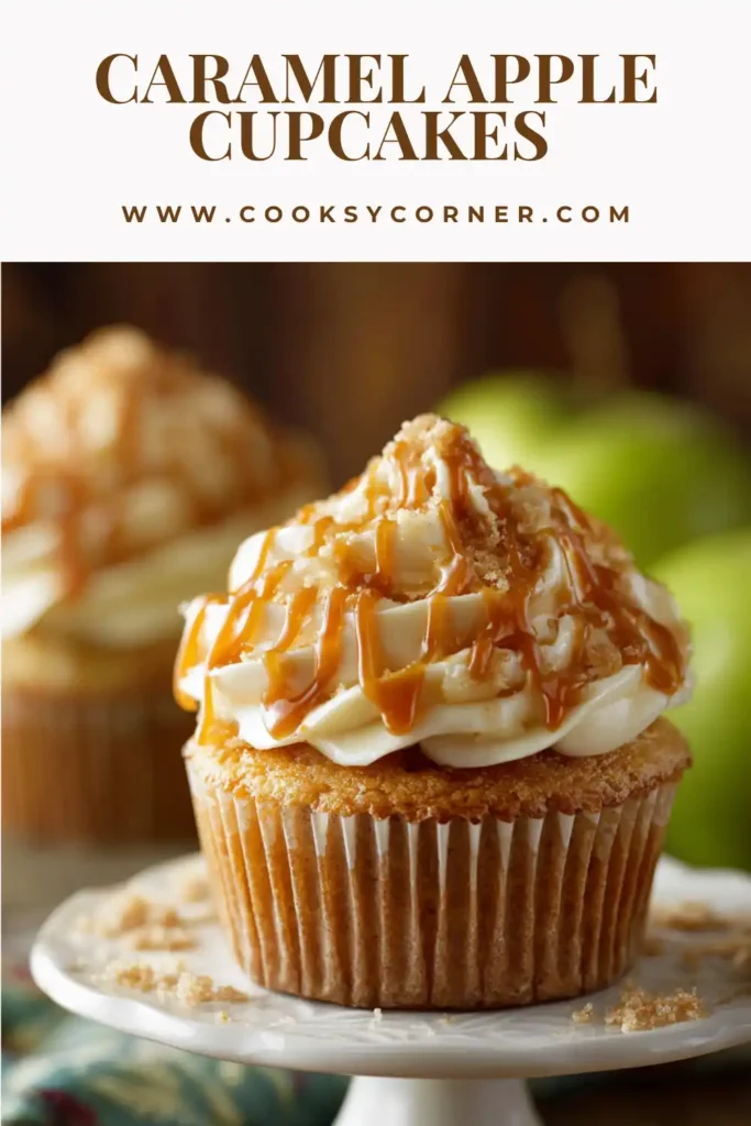 Homemade caramel apple cupcakes with soft texture and rich topping displayed on a tray.