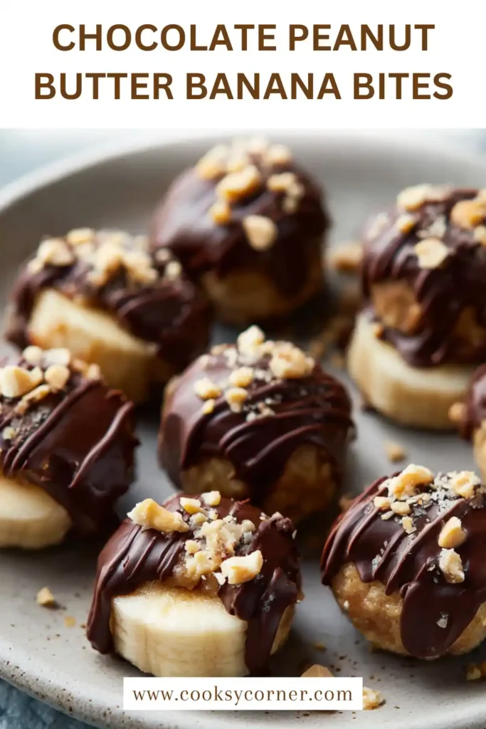 Homemade frozen banana sandwiches dipped in chocolate with glossy coating.