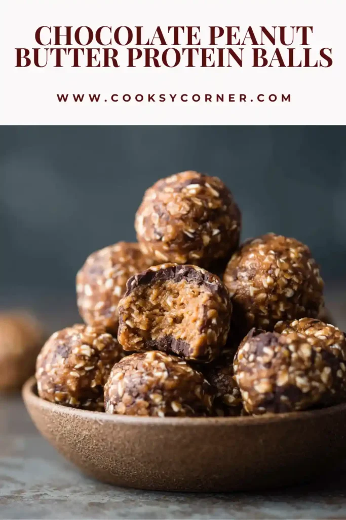 Homemade protein balls with oats and chocolate chips placed neatly on a tray, ready to eat.