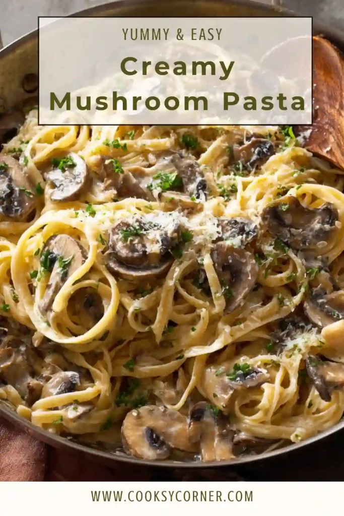 Close-up of pasta coated in creamy mushroom sauce with garlic and herbs.