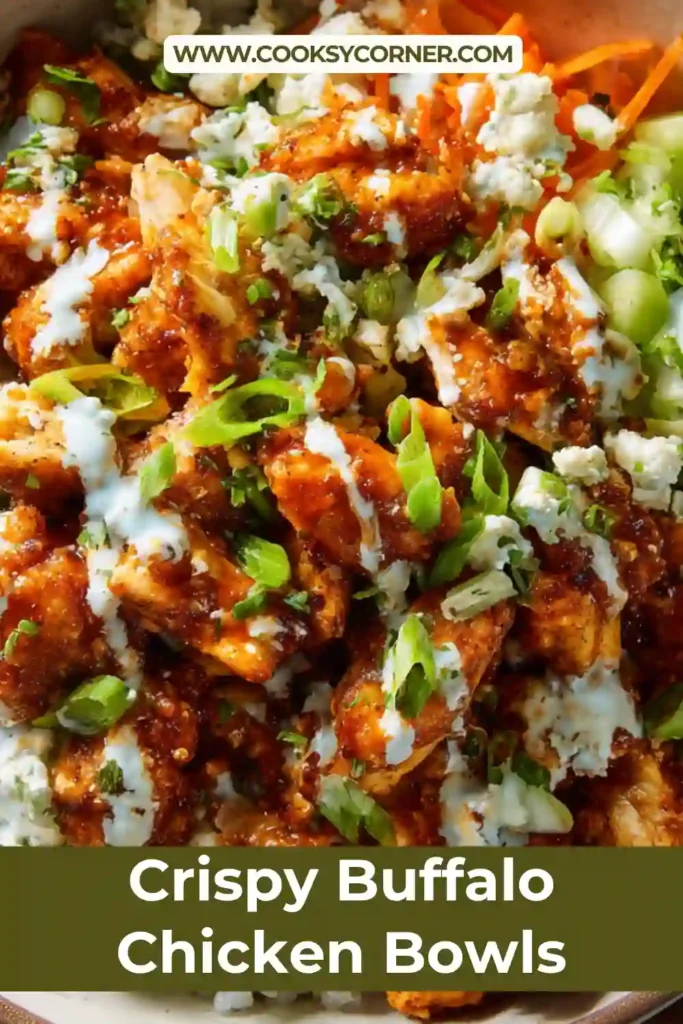 Healthy buffalo chicken bowl with rice and colorful toppings arranged neatly.