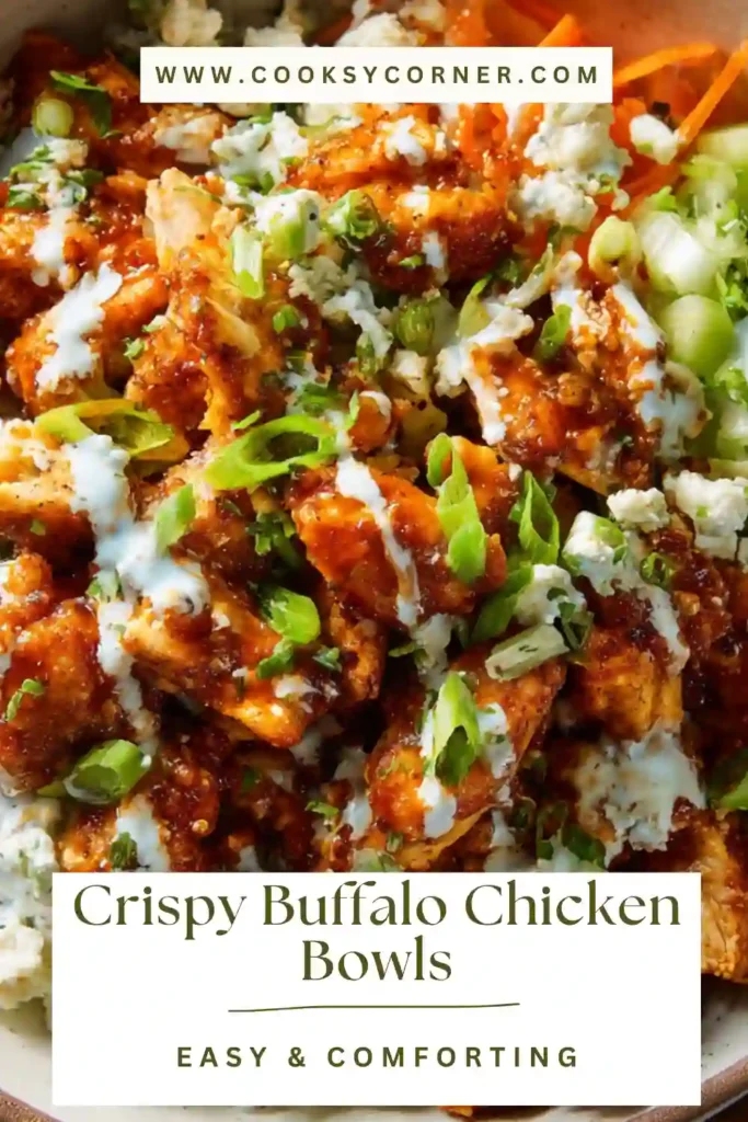 Crispy Buffalo Chicken Bowls with rice, carrots, celery, and avocado topped with spicy sauce.