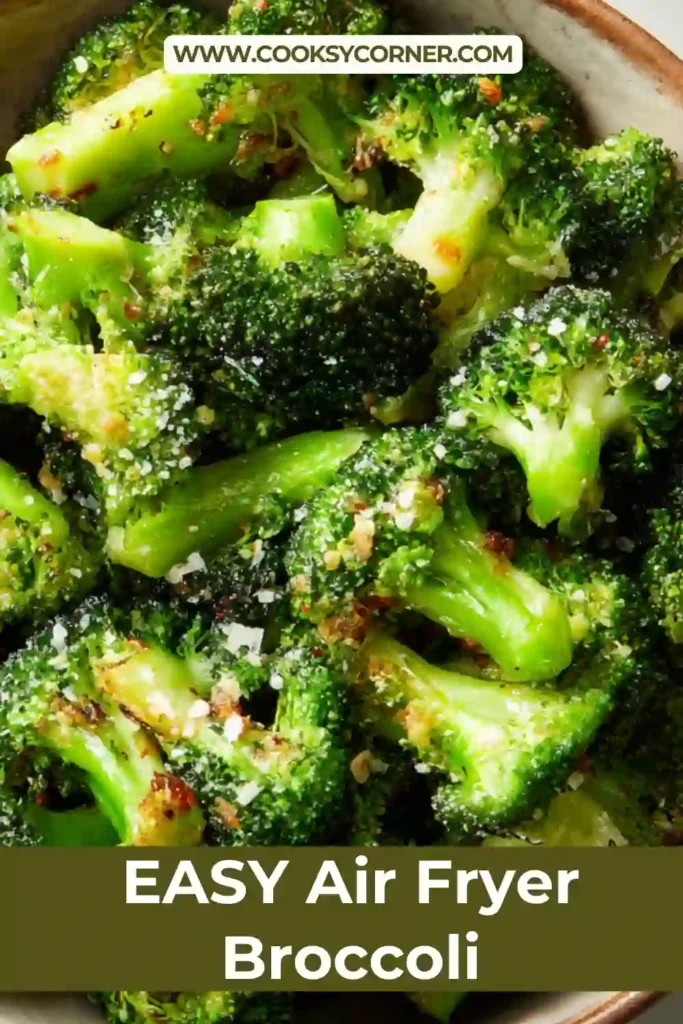 Freshly cooked air fryer broccoli in a serving dish with crispy tips and tender stems. A healthy vegetable side dish.