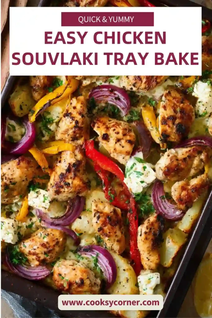 Mediterranean chicken tray bake with juicy chicken thighs, herbs, and colorful roasted vegetables.