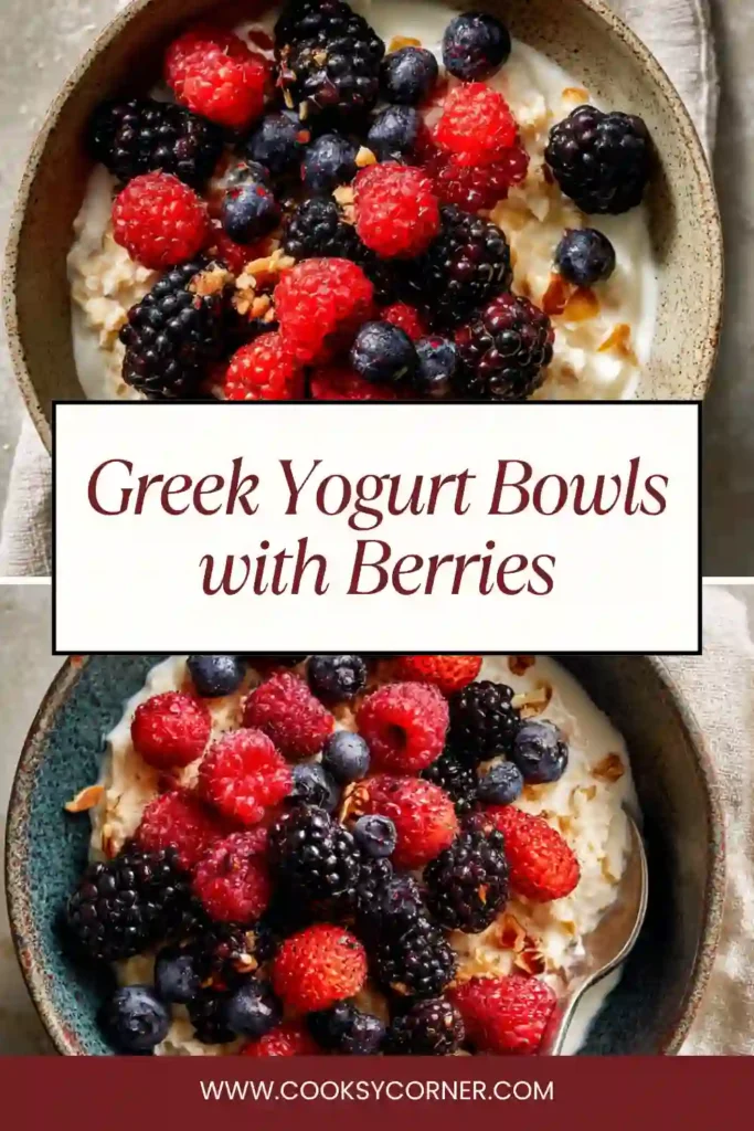 Greek yogurt bowl topped with fresh berries, granola, and honey in a white bowl on a wooden table.