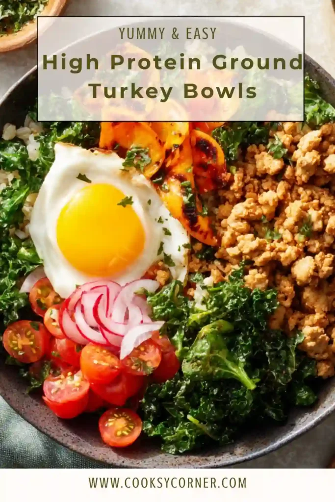 Ground turkey meal prep bowl with sweet potatoes, kale, and fresh vegetables topped with peanut dressing.