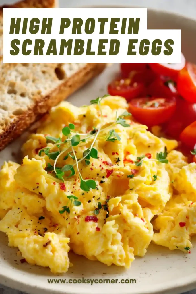 Soft scrambled eggs mixed with cottage cheese showing creamy texture.