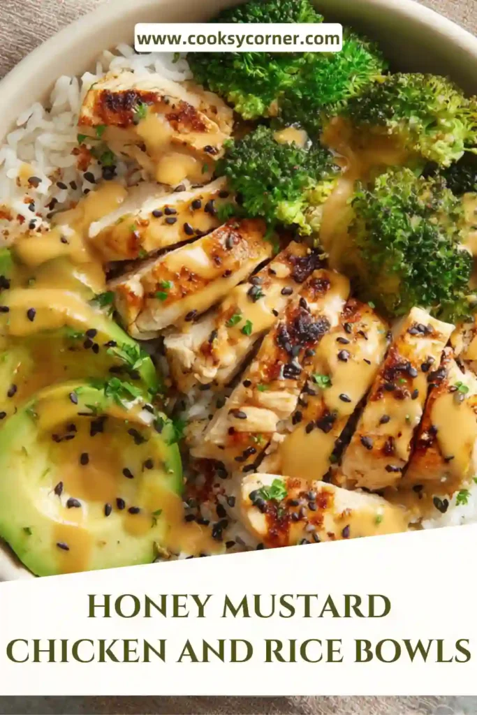 Healthy honey mustard chicken bowl with fluffy rice and colorful roasted vegetables arranged neatly.