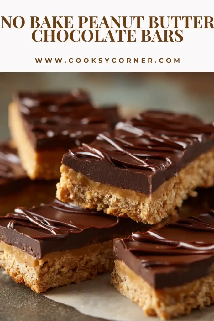 Homemade no bake dessert bars featuring layers of peanut butter and chocolate on a parchment-lined tray.
