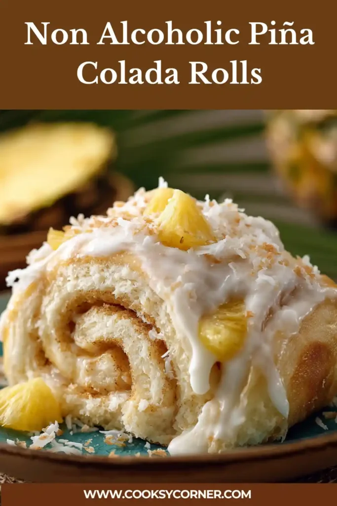 Non-alcoholic piña colada rolls with coconut glaze and pineapple filling.