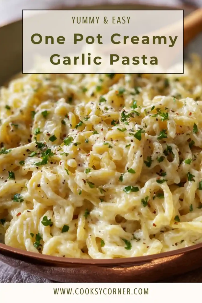 One pot creamy garlic pasta with parmesan and parsley in a pan. Rich and smooth texture.