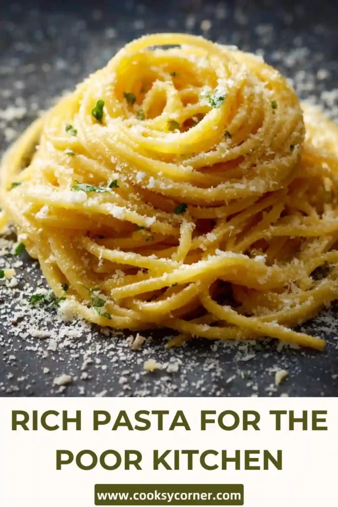 Rich pasta for the poor kitchen with butter garlic sauce and grated Parmesan cheese.