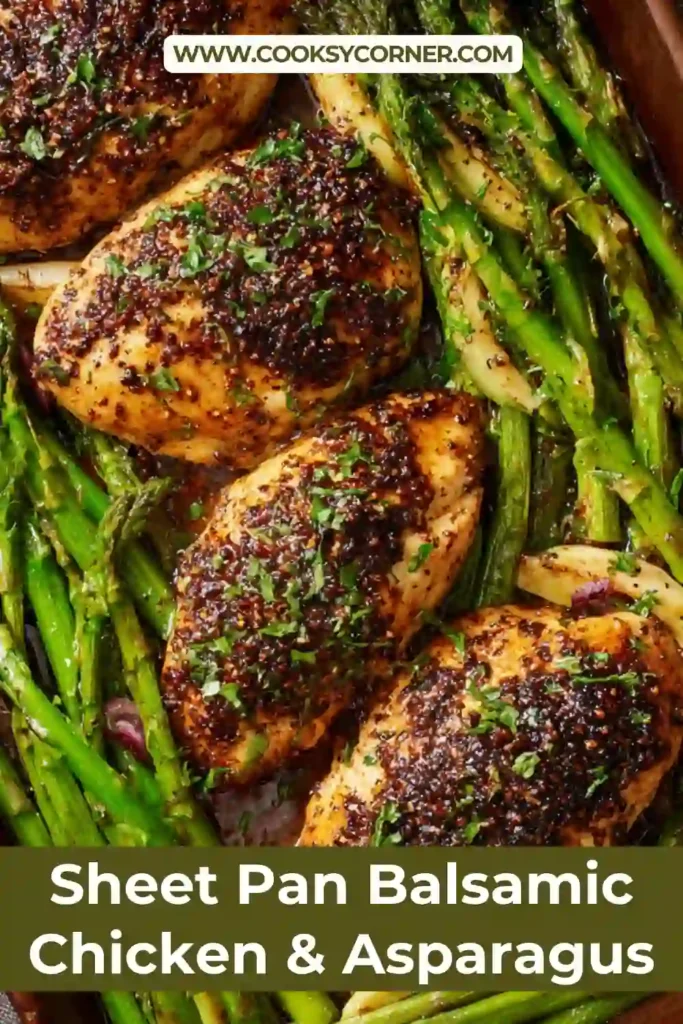 Healthy sheet pan chicken with asparagus and capers, drizzled with balsamic reduction.