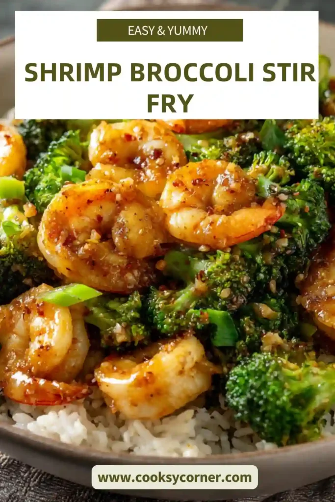 A bowl of shrimp broccoli stir fry served over brown rice with glossy sauce and fresh scallions on top. The shrimp are perfectly cooked and vibrant pink.