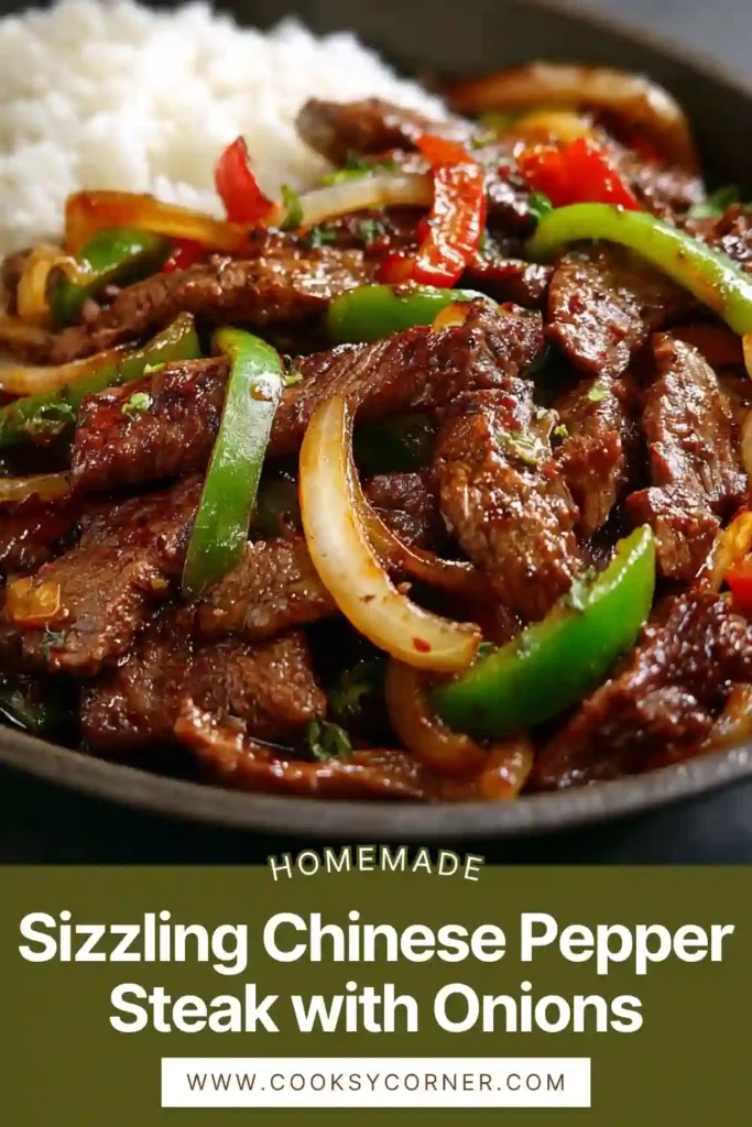 Close-up of beef stir fry with onions coated in rich Chinese sauce.